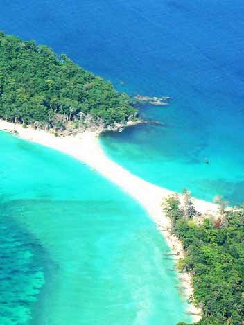 Radhanagar Beach turquoise waters at sunset